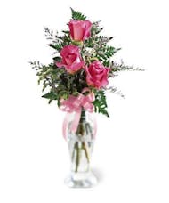 3 roses in a bud vase pink