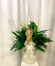 Peace Lily with Religious Statue